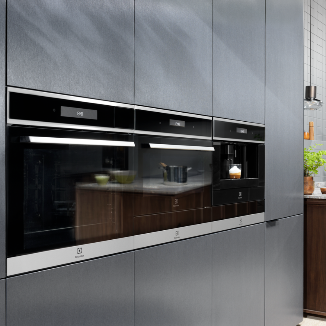 Modern kitchen withElectrolux 600 Series Integrated Warming Drawer Stainless Steel and gray cabinets
