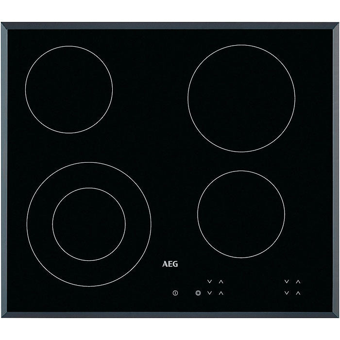 AEG electric hob with four heating zones on a black background