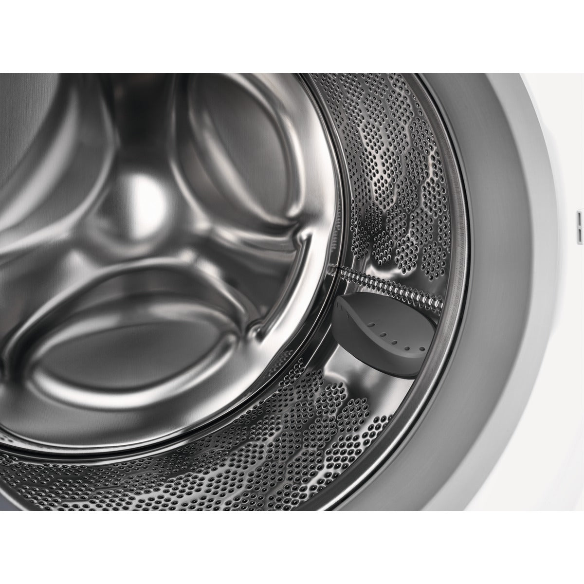 Close-up of an AEG washing machine drum with metallic interior