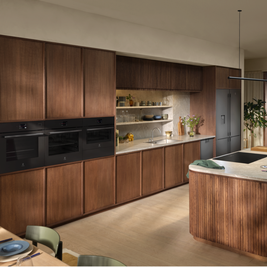 Modern kitchen with wooden cabinets and black appliances Electrolux 600 Series Built In Warming Drawer