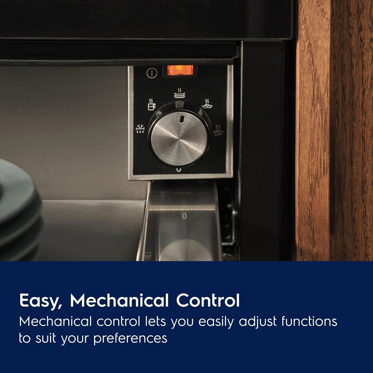 Control panel with mechanical control knob on a Electrolux 600 Series Built In Warming Drawer , featuring text about easy adjustment.