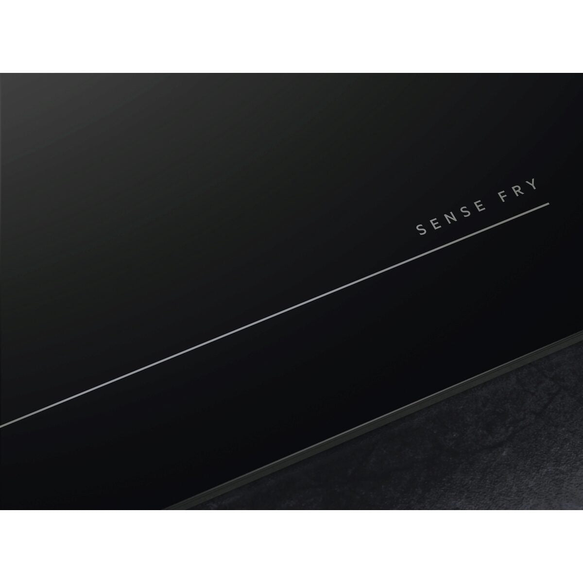 Black AEG Indiuction Hob surface with 'SENSE FRY' text on a white background