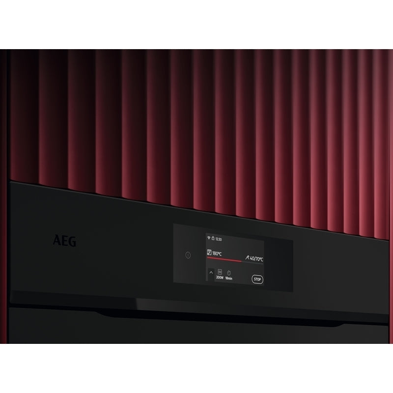 AEG oven with digital display and red interior
