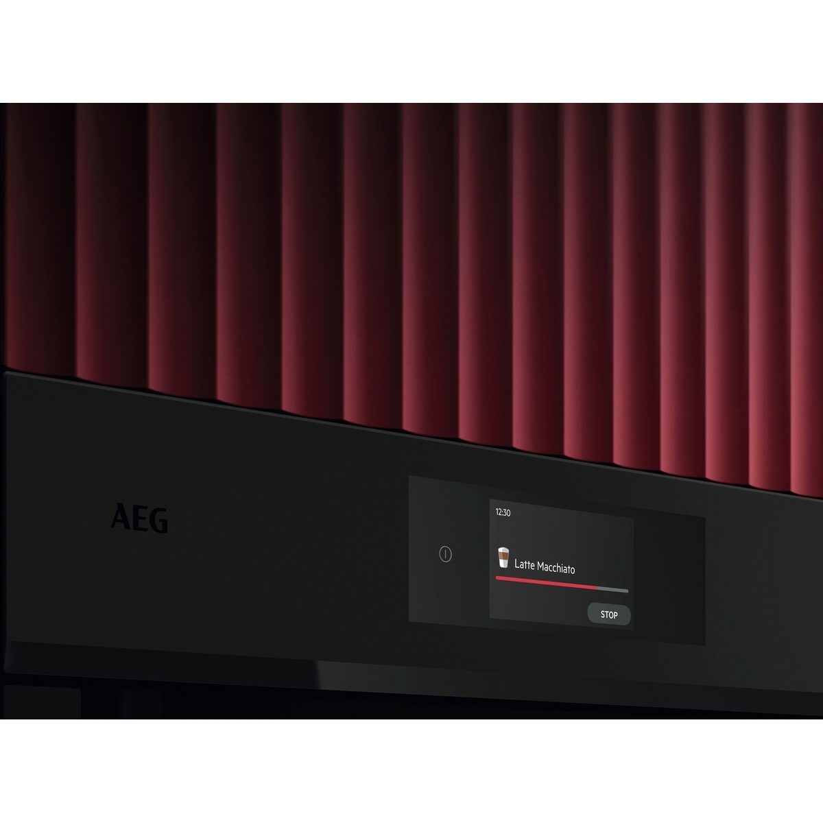 AEG kitchen appliance with red interior and digital display