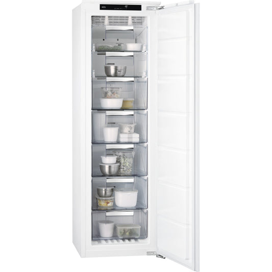 AEG No Frost Freezer with open door displaying various food items on a white background.