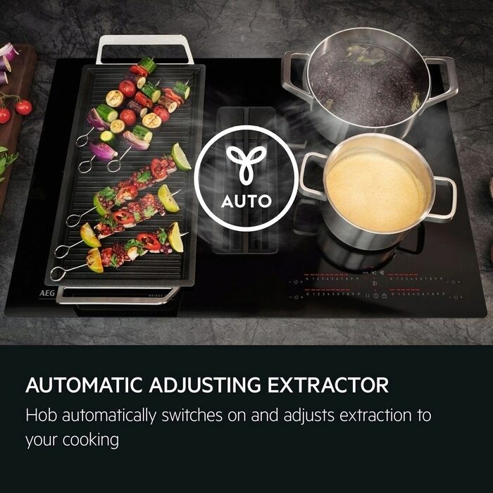 AEG Hob with cooking utensils and 'AUTO' brand logo, featuring an automatic adjusting extractor.
