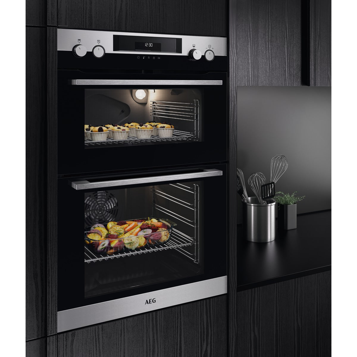 AEG double oven in a kitchen setting with food inside
