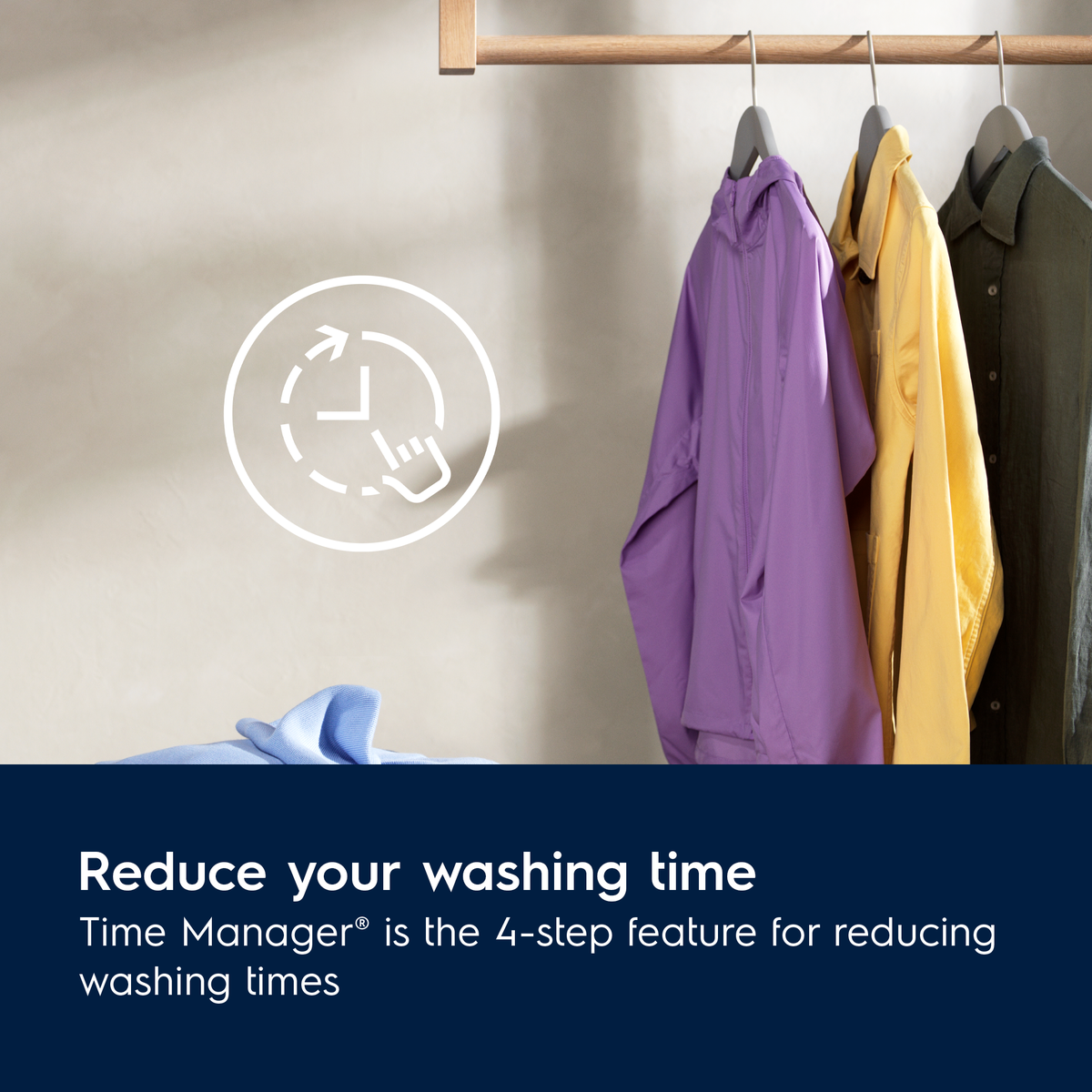 Purple, yellow, and green shirts hanging on a rack with text about reducing washing time with Electrolux Time Manager.