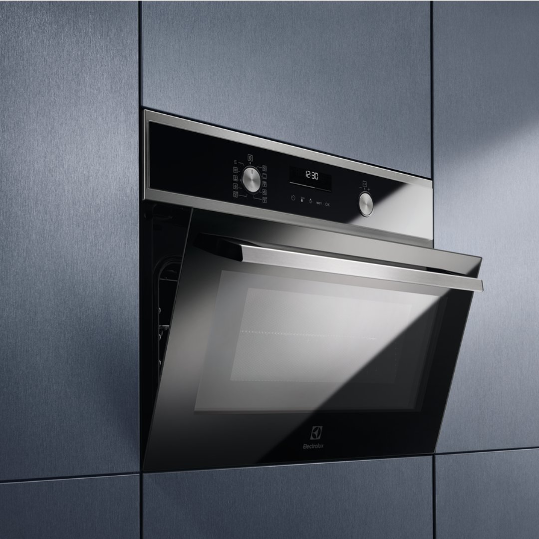 Electrolux 600 Series CombiQuick® Microwave and Built-in Oven Stainless Steel oven embedded in gray kitchen cabinets