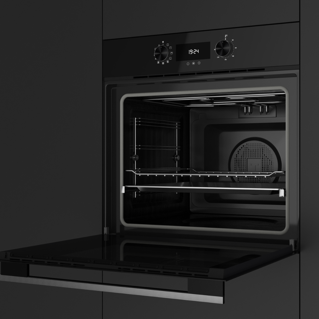 Modern black TEKA oven with open door on a dark background