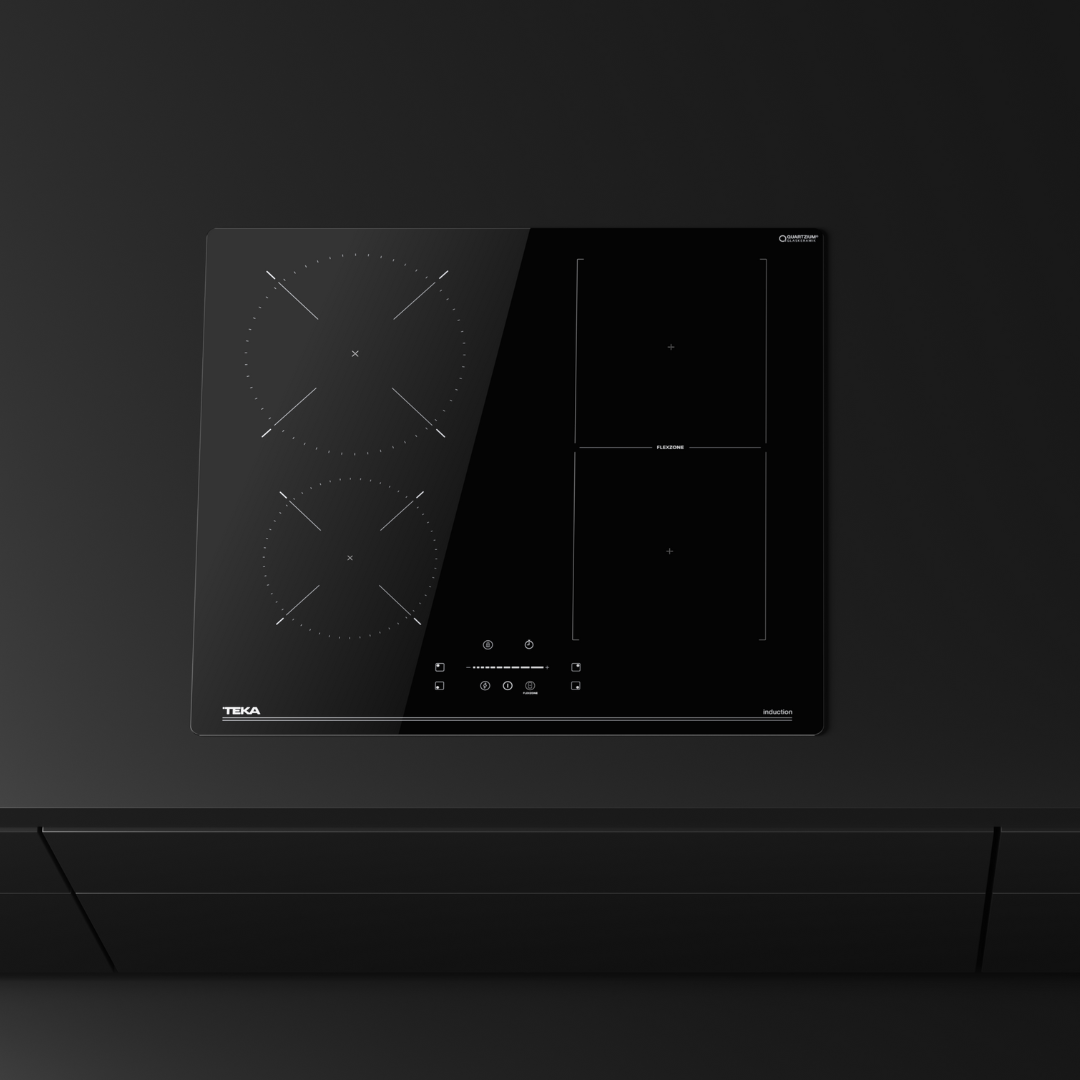 Black TEKA induction Hob on a dark background