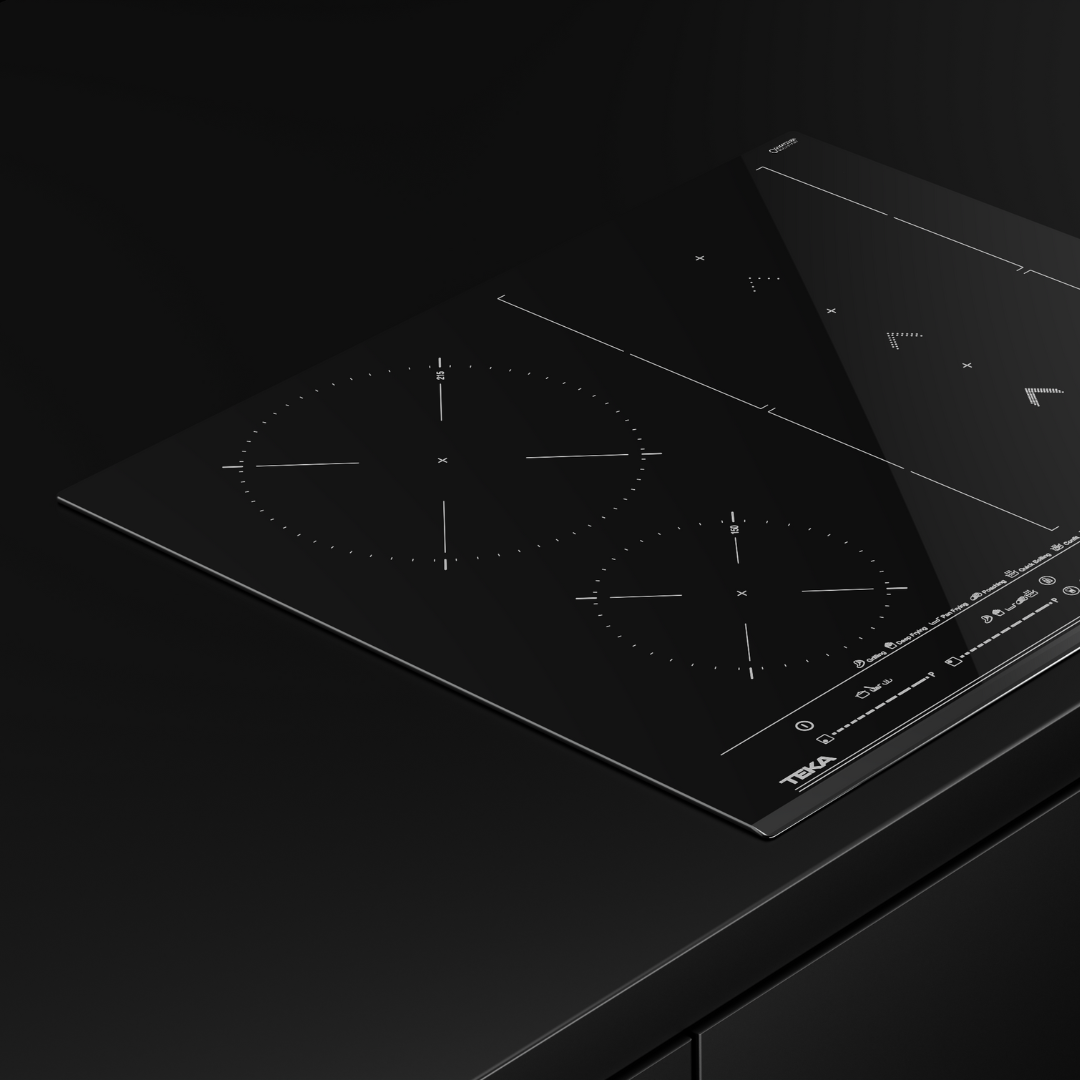 Black TEKA induction Hob on a dark background