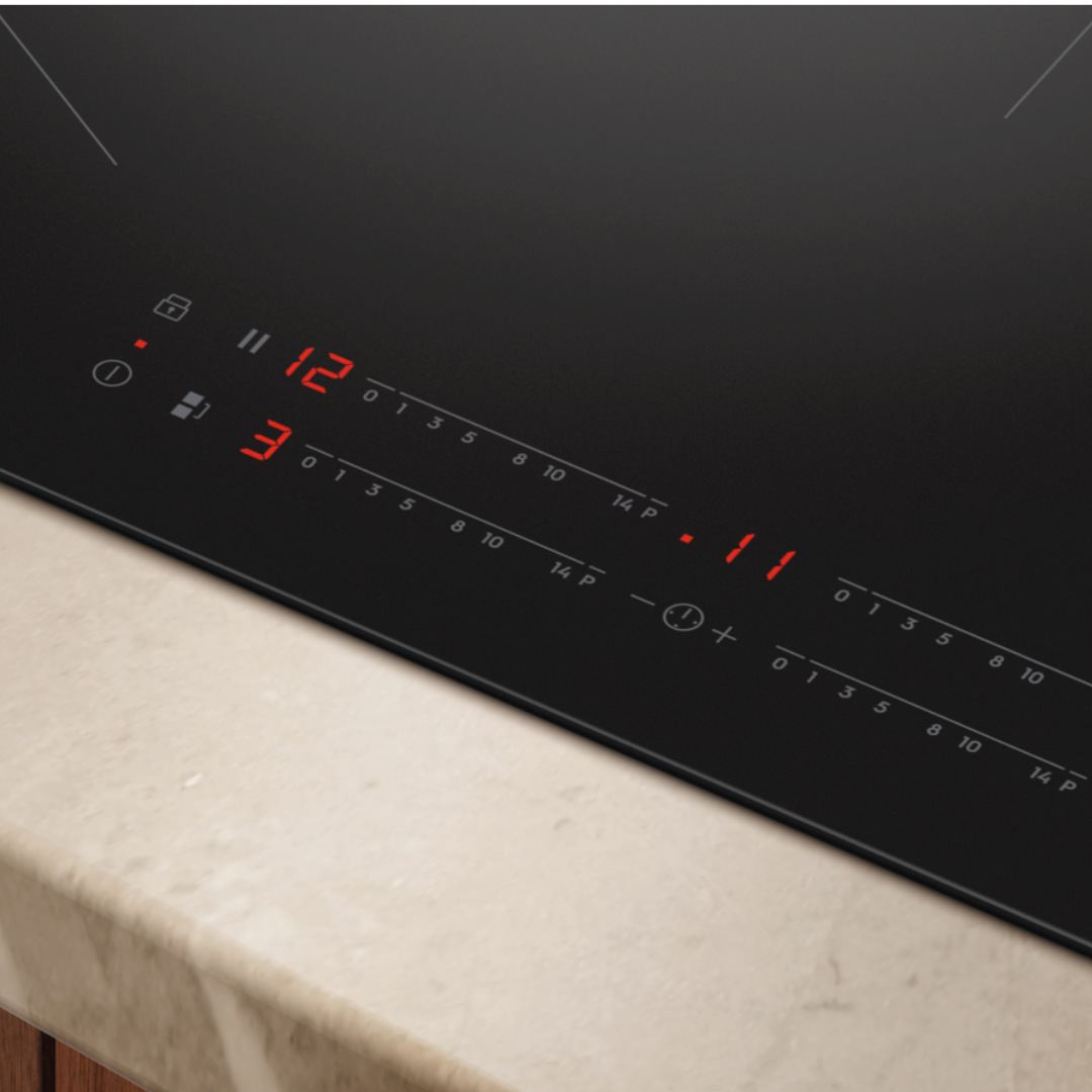 Black Electrolux induction hob with digital display on a kitchen counter