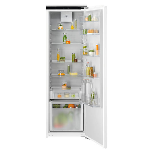 White Electrolux refrigerator with open door displaying various food items on a white background