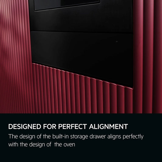 Red kitchen cabinet with AEG black built-in warming drawer and text 'Designed for perfect alignment'.
